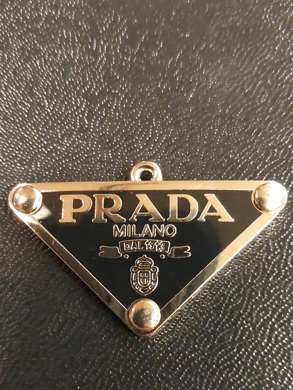 Prada Black and Gold Triangle Logo Charm Pendant